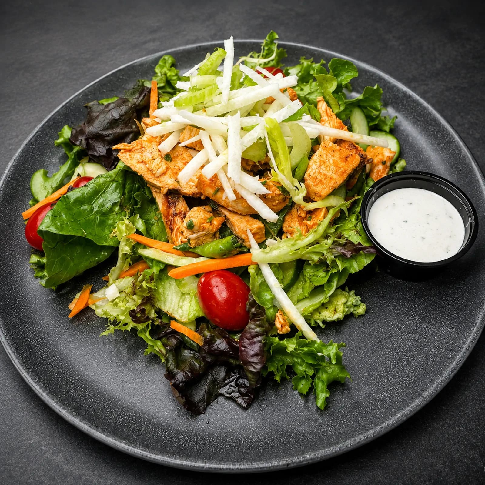 Buffalo Chicken Salad — mixed greens, cucumbers, tomato, carrots and celery / Jicama Slaw w/ parmesan peppercorn ranch