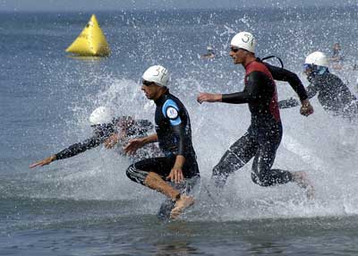Sports nutrition is important for performance such as participating in the swimming portion of this triathlon