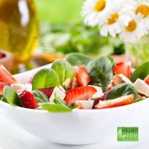 Spring foods can be used in dishes such as this salad with strawberries