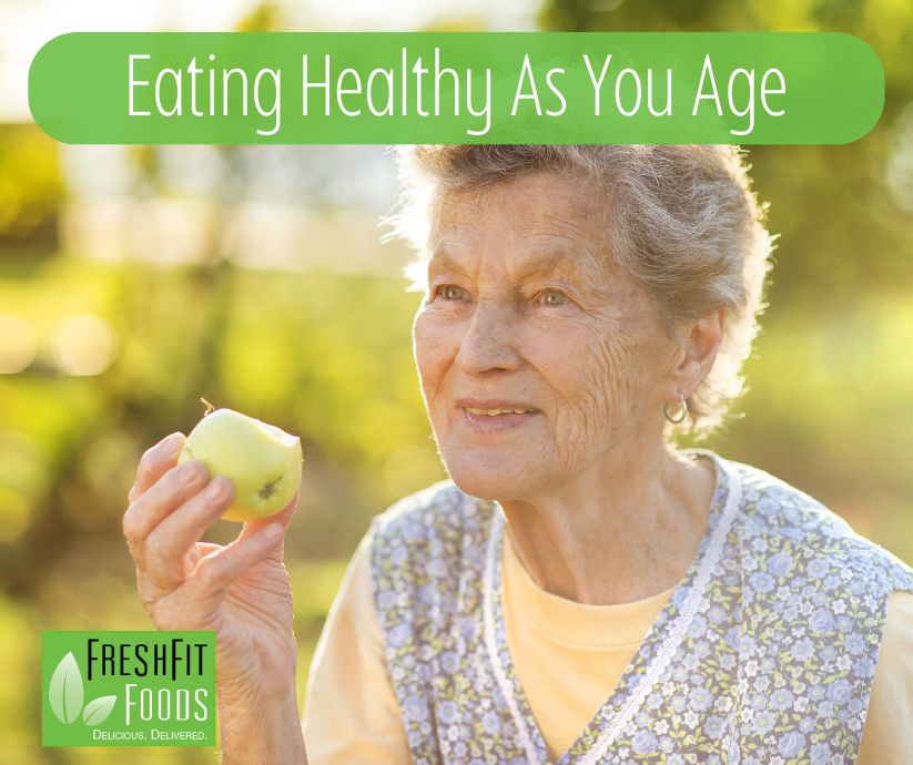 Woman eating an apple to get nutrients seniors need for healthy aging